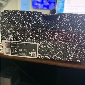 Air Jordan 4 Retro Sneakers